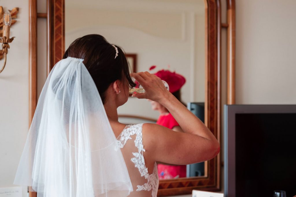 bride drinking prosecco