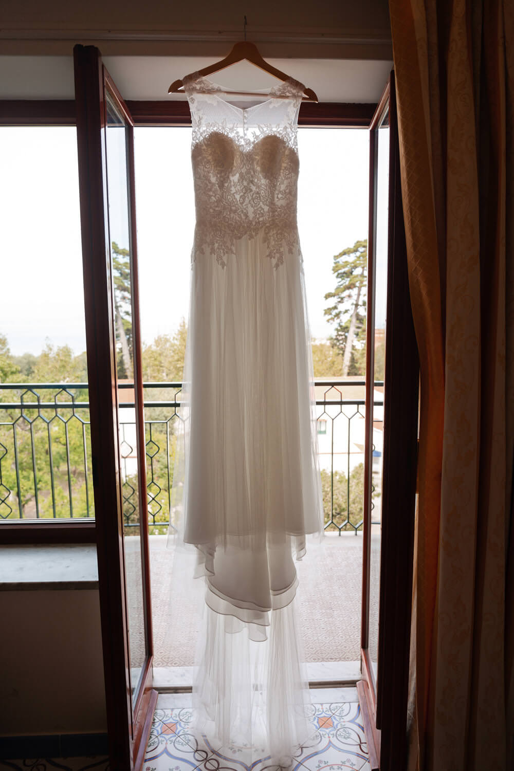 brides dress in window