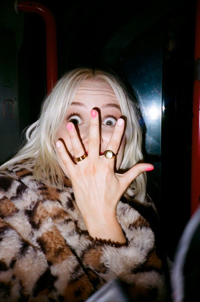 bride showing off wedding ring 35mm