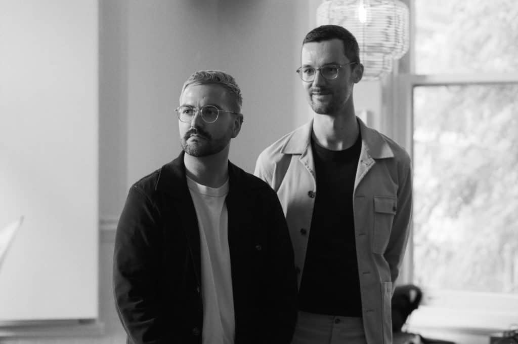 black and white portrait of grooms on medium format film