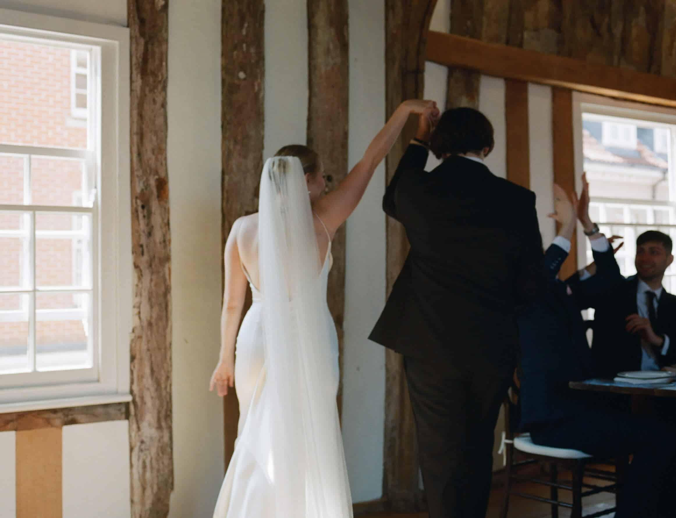 couple arrives at wedding reception
