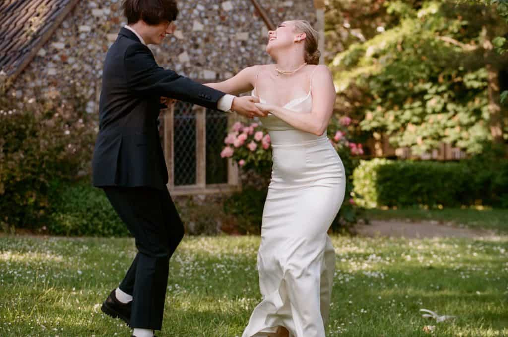 bride and groom dancing 35mm