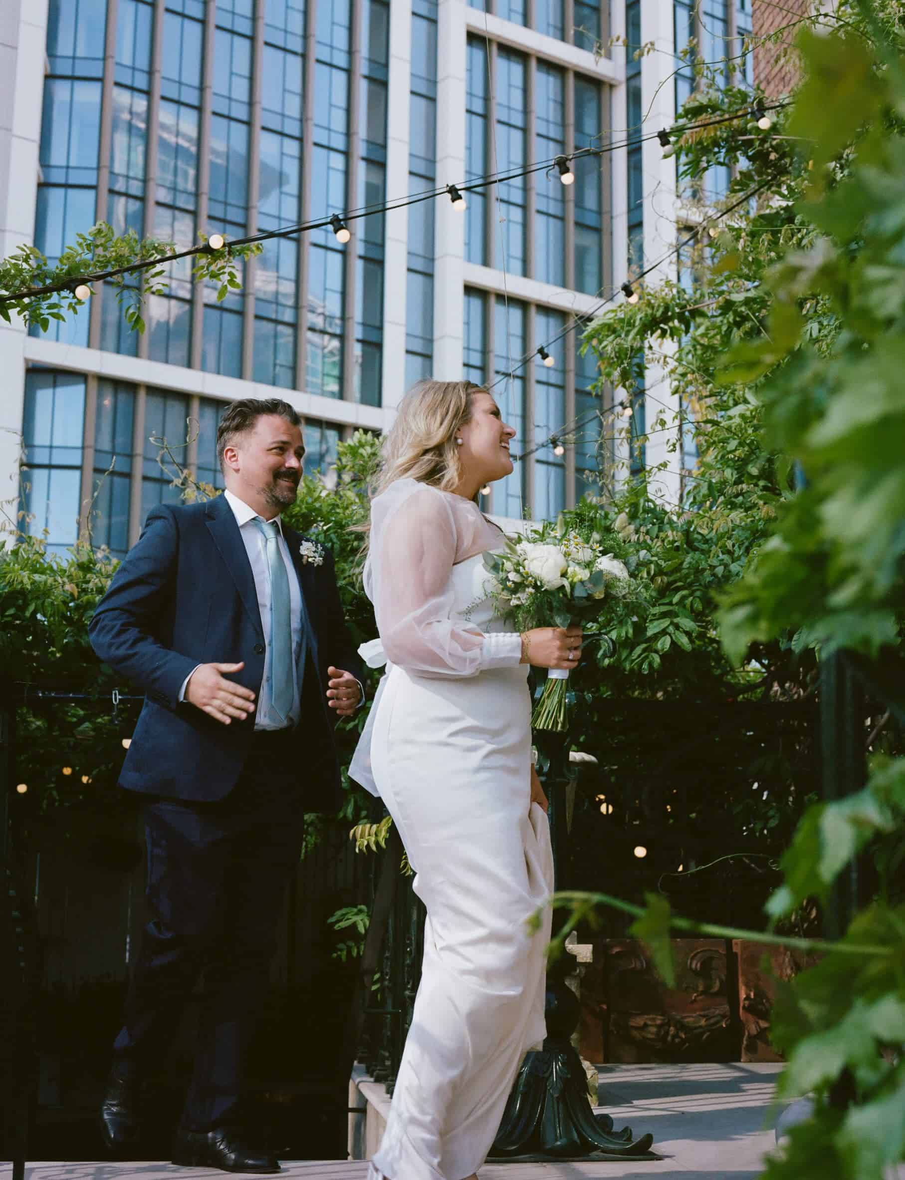 bride and groom enter brunswick house 35mm