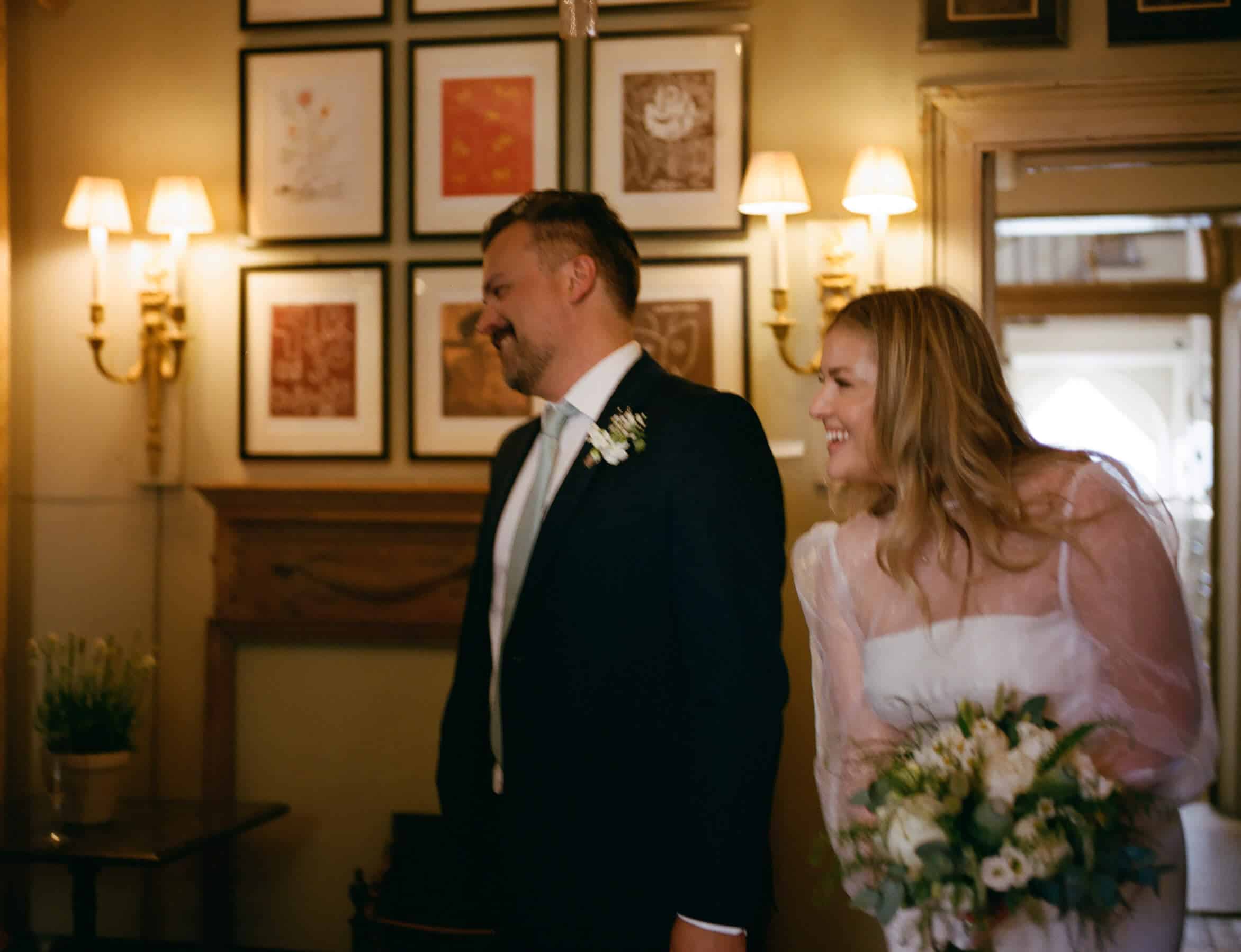 bride and groom enter brunswick house 35mm